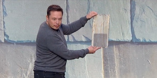 Elon Musk showing the new Tesla Solar Roof